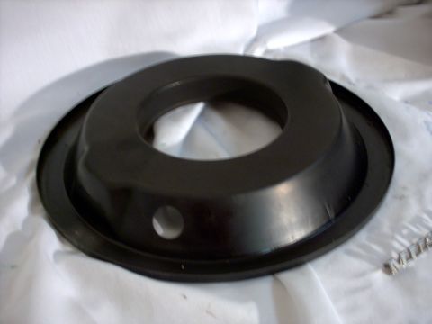 1965 Ford Mustang - This is a black metal air cleaner lid, likely for a classic car. It has a central opening and a small hole on its side.