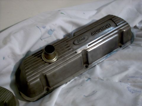 1965 Ford Mustang - A Ford Motorsport valve cover is shown, embossed branding and a ribbed design.