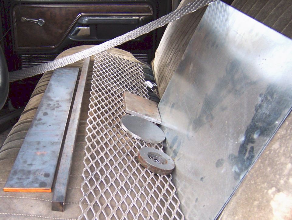 Interior of vehicle with metal sheets and mesh