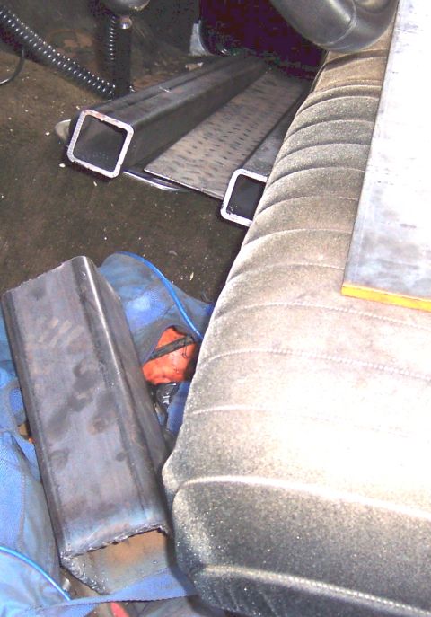 1978 Ford Bronco - Metal tubing and a car seat are visible in this image, suggesting a project or repair.