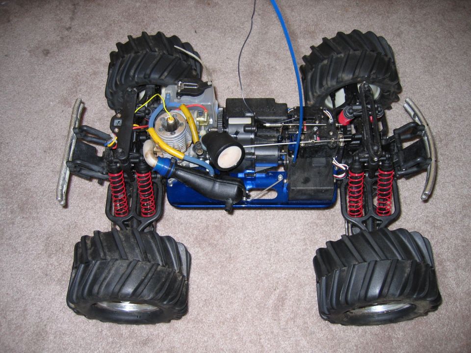 remote control monster truck with large tires and exposed engine