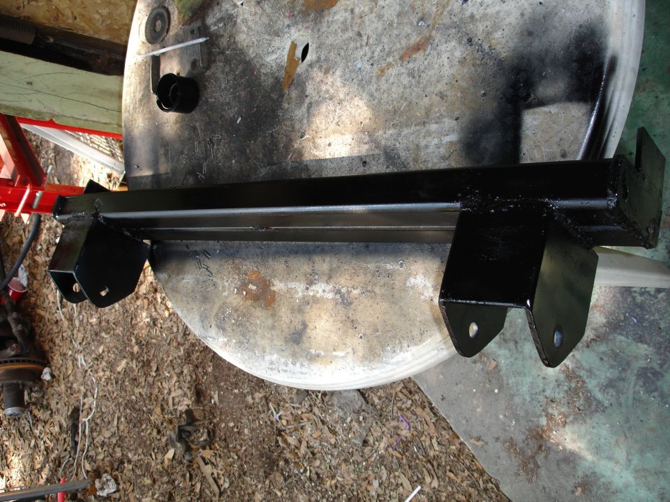 black trailer hitch receiver on workbench