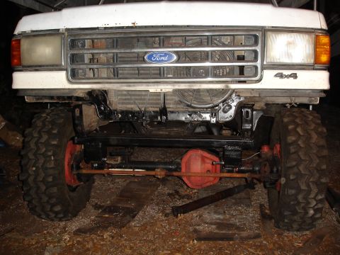 1989 Ford Bronco - This Ford truck features a prominent grille with the Ford logo and 4x4 badging, suggesting a model year around 1987.
