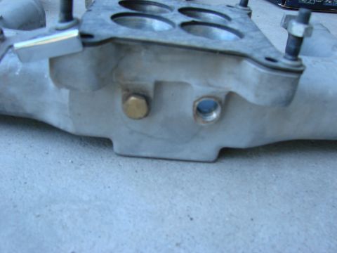 1979 Ford Bronco - Close-up of an aluminum intake manifold, showing its construction and ports.