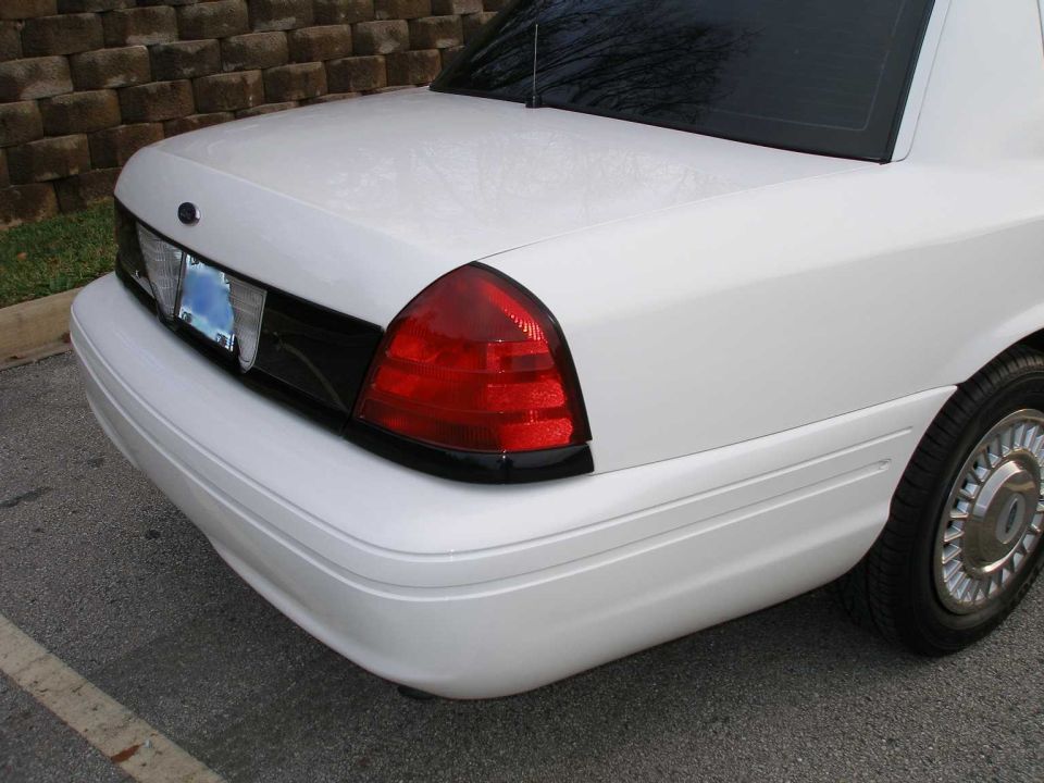 White 2001 Ford Crown Victoria rear quarter panel and taillight