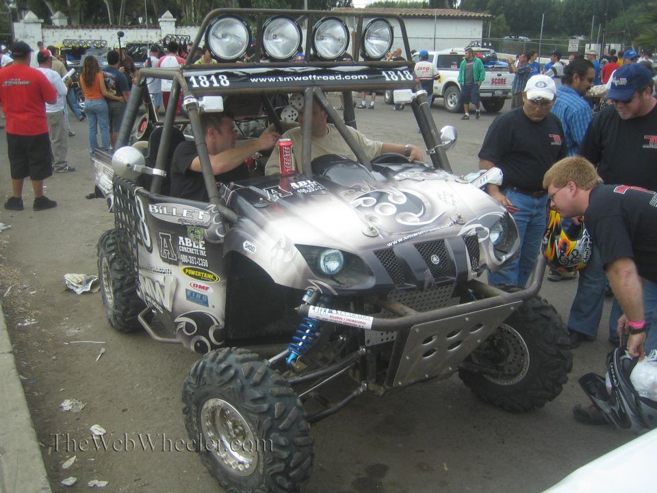 Yamaha Rhino side-by-side race UTV number 1818 with light bar and graphics
