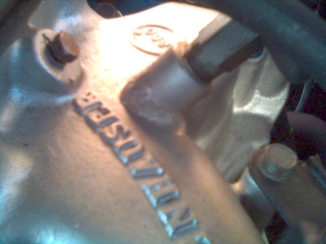 weld repair, a 1" piece of bar stock was added, drilled and tapped
