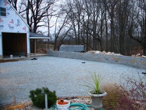 1992 Ford Bronco - Construction scene with gravel yard, unfinished building, and cinder block wall.