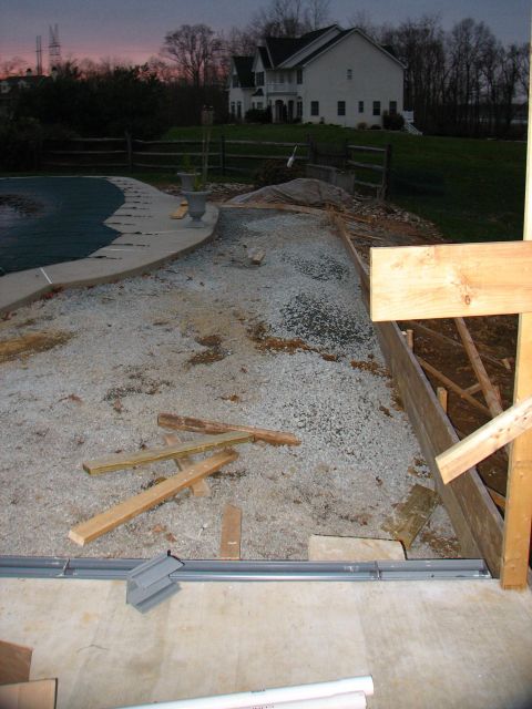 1992 Ford Bronco - Outdoor scene shows a construction area with a pool and a large house in the background.
