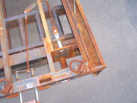 1979 Ford F-350 - left rear corner with rear support jack locking handle pulled out in to "unlocked" position