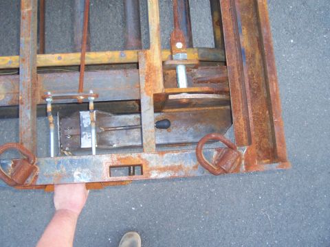 1979 Ford F-350 - A pull of the rear support jack's release handle will pull the 1.25" pin on the jack, and allow the jack to drop in to the verticle position