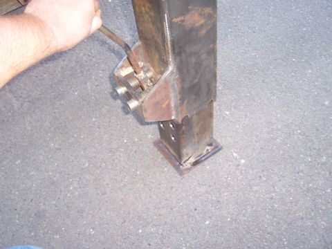1979 Ford F-350 - An easy pull of this handle will drop the "drop leg" down to the ground. Releasing the handle will lock it in place in 7/8 of an inch incra…