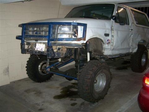 1995 Ford Bronco - Modified Ford Bronco with aftermarket bumper and suspension modifications.