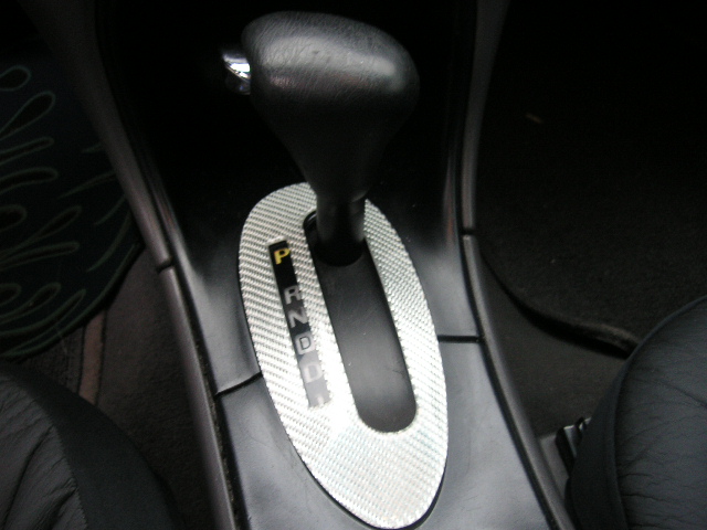 Interior view of automatic gear shifter with P, R, N, D indicators