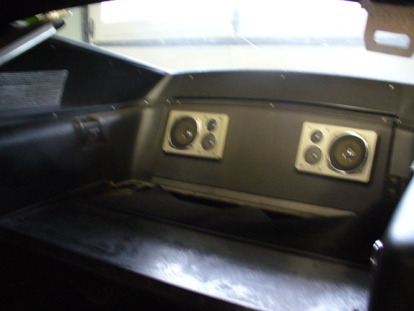 1968 Ford Mustang rear interior showing speakers mounted on the back panel