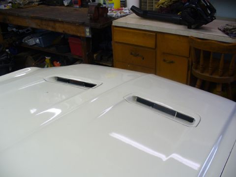 1968 Ford Mustang - Close-up of the hood of a 1968 Ford Mustang, dual vents and the "SUPERMOTORS.NET" watermark.