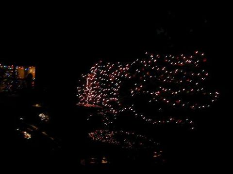 1986 Ford Bronco - A dark scene illuminated by numerous Christmas lights, creating a festive atmosphere.