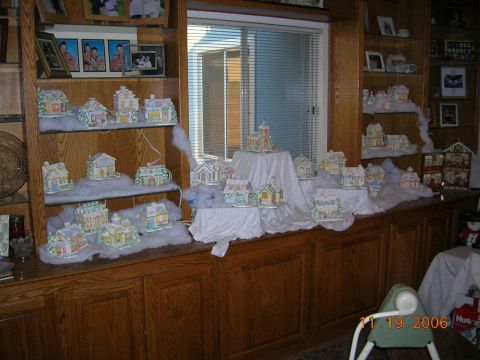 1985 Ford Bronco - A collection of ceramic village houses is arranged on shelves, decorated with artificial snow.