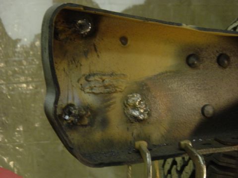 1991 Ford Bronco - Close-up view of a metal component showing evidence of welding and repair work.