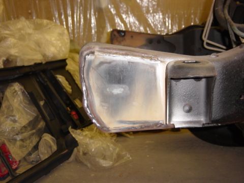 1991 Ford Bronco - Vehicle frame section with visible repair work and welding.
