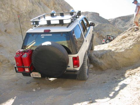 1997 Ford Ranger - This SUV is equipped for off-roading with extra fuel cans and a spare tire mounted on the back.