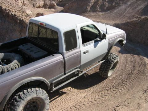 1997 Ford Ranger - This 1997 Ford Ranger is equipped with off-road tires and appears to be navigating a dirt trail.