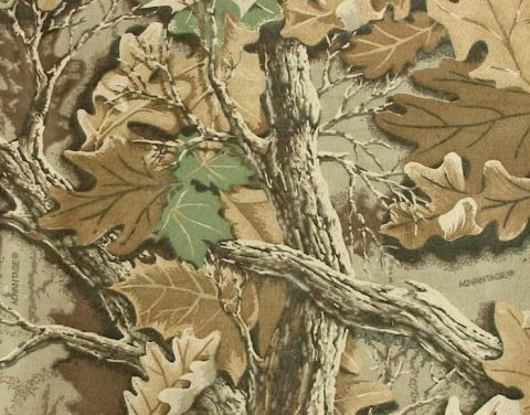 1985 Ford Bronco - This image displays a camouflage pattern oak leaves and tree branches, with an "ADVANTAGE" logo visible.