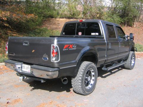 2005 Ford F-250 - This Ford F-250 Super Duty pickup truck is shown from the rear, an FX4 Off Road decal.