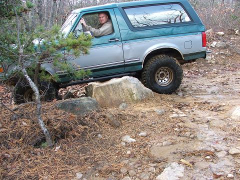 1996 Ford Bronco - This 1996 Ford Bronco navigates a rocky trail, its off-road capabilities.