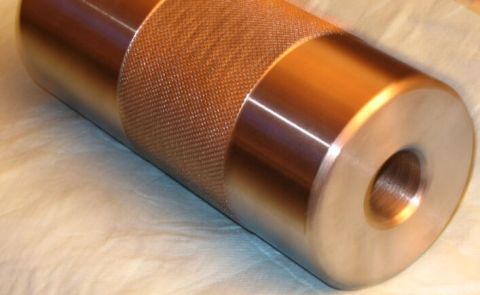 1990 Ford Bronco - This is a metal part with a knurled grip and a threaded opening.