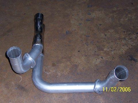 1991 Ford Bronco - Custom exhaust pipe assembly shown on a concrete floor, dated 11/02/2006.