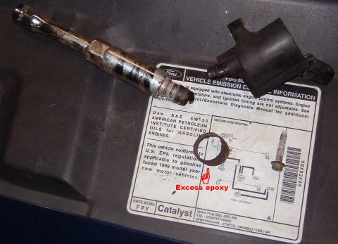 1999 Ford Crown Victoria - Since I didn't clean the wall of the head, the epoxy broke free easily, and I had no trouble backing the socket & plug out. Even the excess…