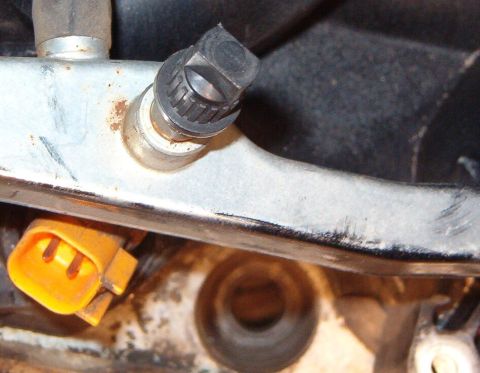 1999 Ford Crown Victoria - I should have known the camera wouldn't focus on the bottom of the hole, but it's relatively free of epoxy residue or threads. There is som…