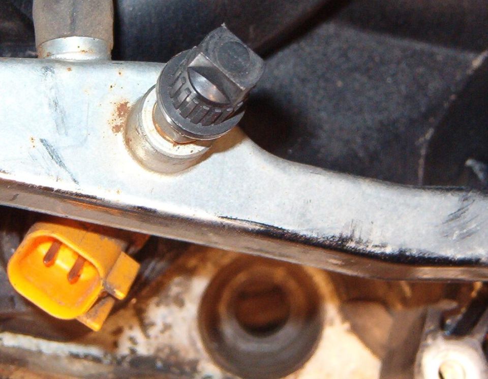 I should have known the camera wouldn't focus on the bottom of the hole, but it's relatively free of epoxy residue or threads.  There is some debris on the piston, but it will be cleaned out later.
