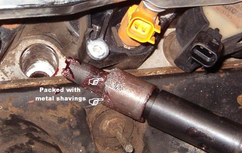 1999 Ford Crown Victoria - Following the instruction, I loaded the cutter with grease to collect the majority of the shavings. It worked well, and the few that did fa…