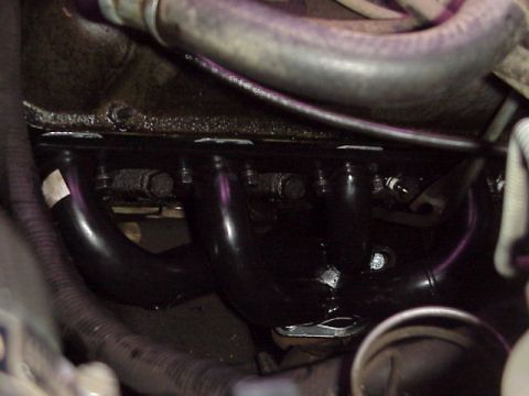 1989 Ford Bronco - Exhaust manifold detail, likely from an older vehicle's engine bay.