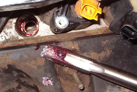 1999 Ford Crown Victoria - The tap also has a pilot tip, and the instructions recommend grease again. I used a manual ratchet to drive the tap, but the air ratchet to…