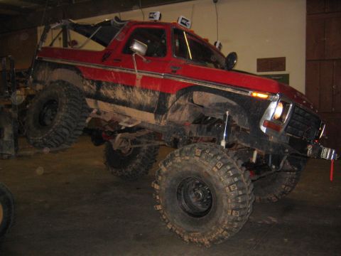 1979 Ford Bronco - This modified 1979 Ford Bronco features a lifted suspension and aggressive off-road tires, ready for challenging terrain.