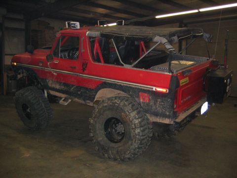 1979 Ford Bronco - This modified SUV features a roll cage and off-road tires, suggesting it's built for terrain.