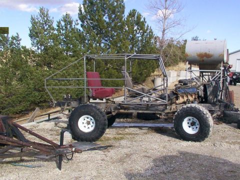 1978 Ford Bronco - This custom build features a roll cage, exposed engine, and large tires, suggesting a project in progress.