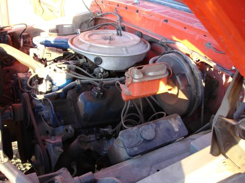1979 Ford F-150 - Close-up view of a V8 engine bay, showing various components and wiring.