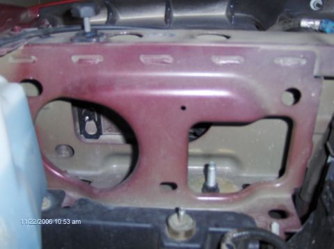 2004 Ford Crown Victoria - This photo shows a vehicle's engine bay mounting bracket, not the exterior of a 2004 Ford Crown Victoria.