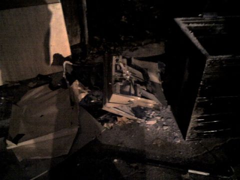 1987 Ford Bronco - The scene shows significant destruction and debris, with no identifiable vehicle present.