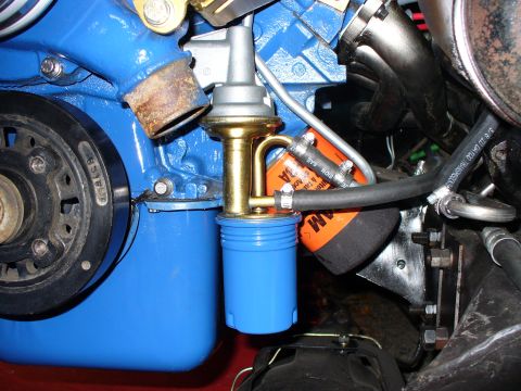 1978 Ford Bronco - This image shows a fuel pump and filter assembly on an engine, not a 1978 Ford Bronco.