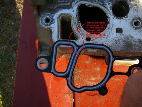 1997 Mercury Grand Marquis - Gasket placement issue on an engine part, with a handwritten annotation explaining the problem.