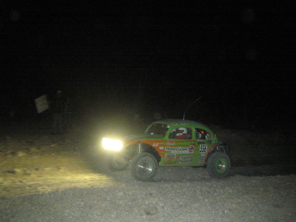 Green Volkswagen Beetle Baja race car number 555 at night