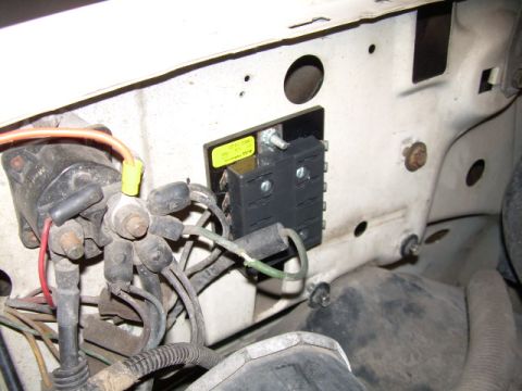 1988 Ford Bronco - New fuse block to run the headlights, relays, and air horns. Be careful not to interfere with the hood hinge comin' down.