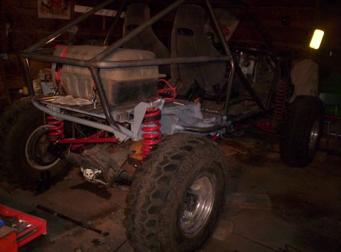 1984 Ford Bronco - This custom buggy is undergoing modifications in a workshop setting.