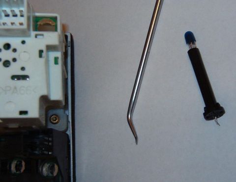1999 Ford Crown Victoria - Straighten them out so the bulb can be removed from the plastic holder.