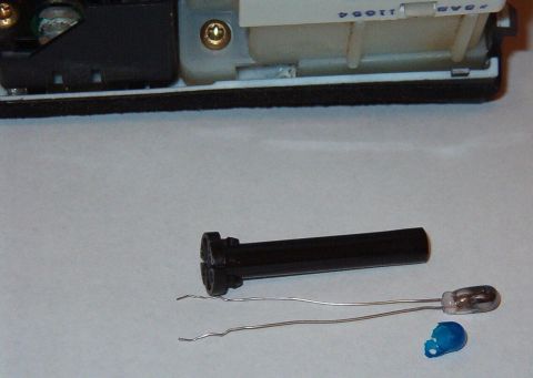 1999 Ford Crown Victoria - It was easier for me to remove the "bulb condom" with the bulb out of the holder because this one had been baked onto the bulb. But if it w…